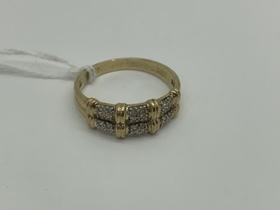 Lot 463 - A Modern Inset Dress Ring, of two row design,...