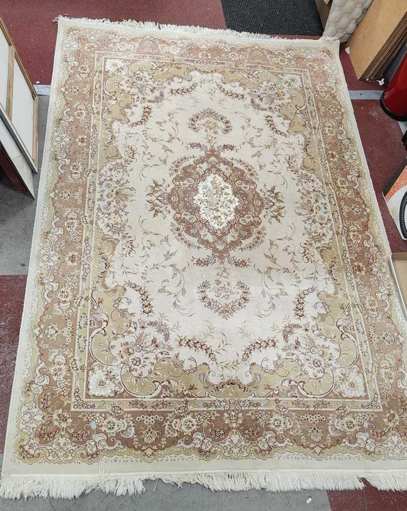 Lot 1463 - Persian Tassled Acrylic Rug, with allover...