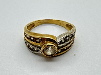 Lot 125 - A Two-Tone Stone Set Dress Ring, of bifurcated...