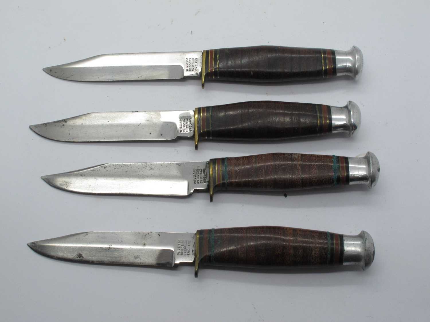 Lot 266 - William Rodgers Bowie Knives, leather handle,...