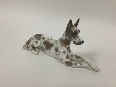 Lot 1107 - A Lladro Porcelain Model of Seated Great Dane...