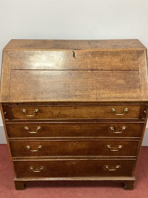 Lot 1483 - An XVIII Century Oak Bureau, with fall front...