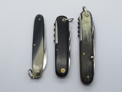 Lot 77 - Three Horn Scaled Pocket Knives, one stamped...