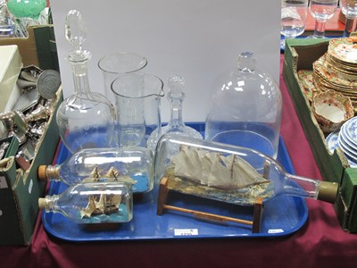 Lot 1235 - Two XIX Century Glass Measures, decanter,...