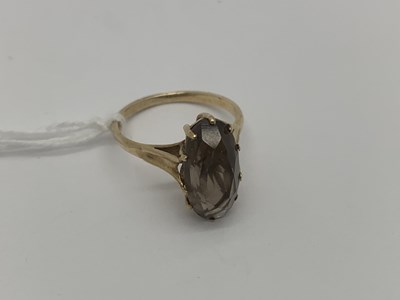 Lot 483 - A Stone Set Dress Ring, oval claw set, between...