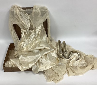 Lot 1353 - An Early XX Century Cream Satin and Silk...