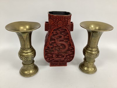 Lot 1144 - A Pair of Chinese Brass Vases, of Gu shape...