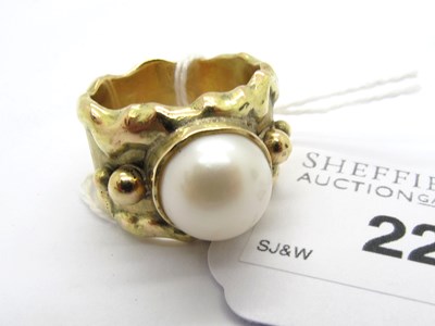 Lot 225 - A 9ct Gold Abstract Mabe Pearl Dress Ring, the...