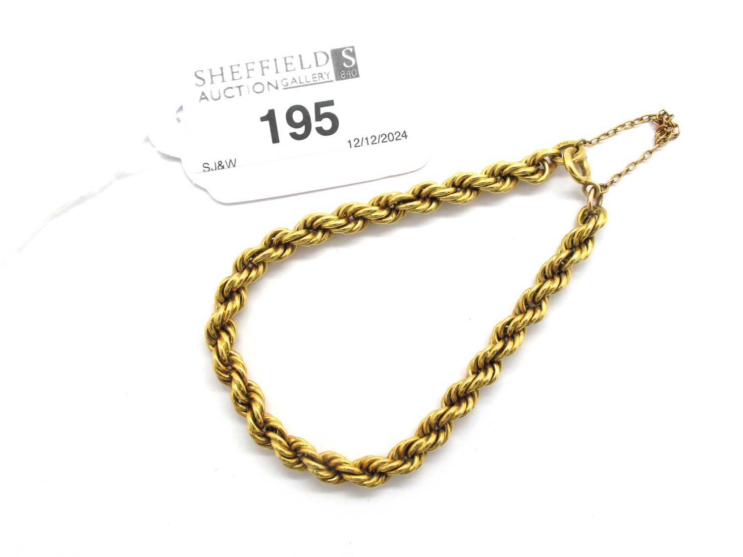 Lot 195 - A Chunky Ropetwist Link Bracelet, to integral...