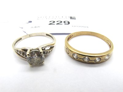 Lot 229 - A Half Eternity Style Ring, cubic zirconia set,...