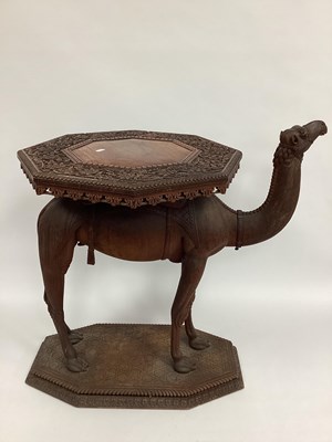 Lot 1336 - An Anglo India Carved Hardwood Camel Table,...