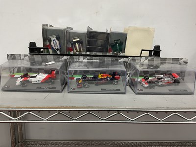 Lot 554 - Fourteen 1:43rd Scale 'Panini F1 Collection'...