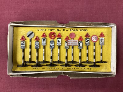 Lot 678 - A Dinky Set No 47 Road Signs, made up of...