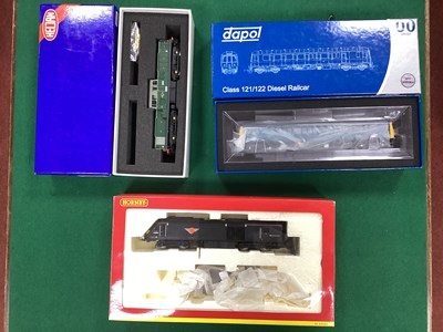 Lot 406 - Three boxed OO gauge diesel outline...