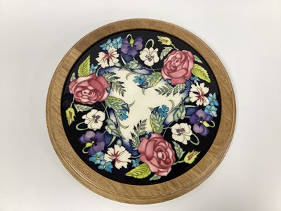 Lot 1055 - A Moorcroft Pottery Circular Plaque, painted...