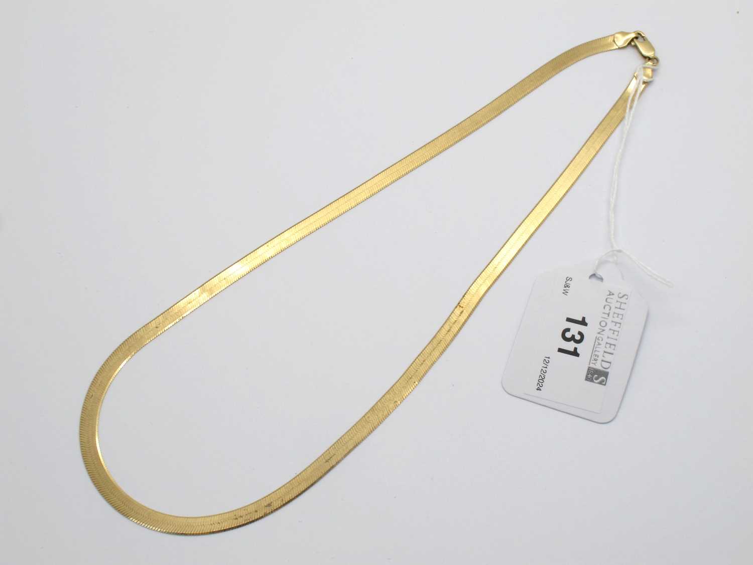 Lot 131 - A 9ct Gold Flat Link Collarette Necklace, of...