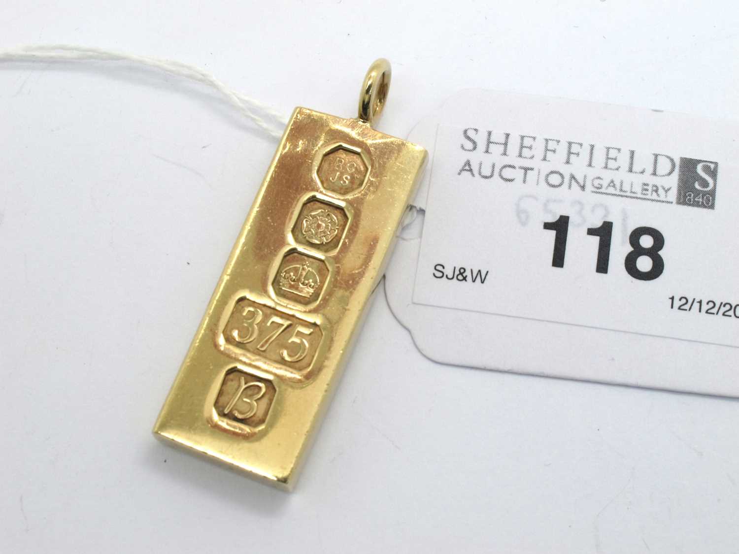 Lot 118 - A 9ct Gold Ingot Pendant, JCJS, Sheffield 1976,...