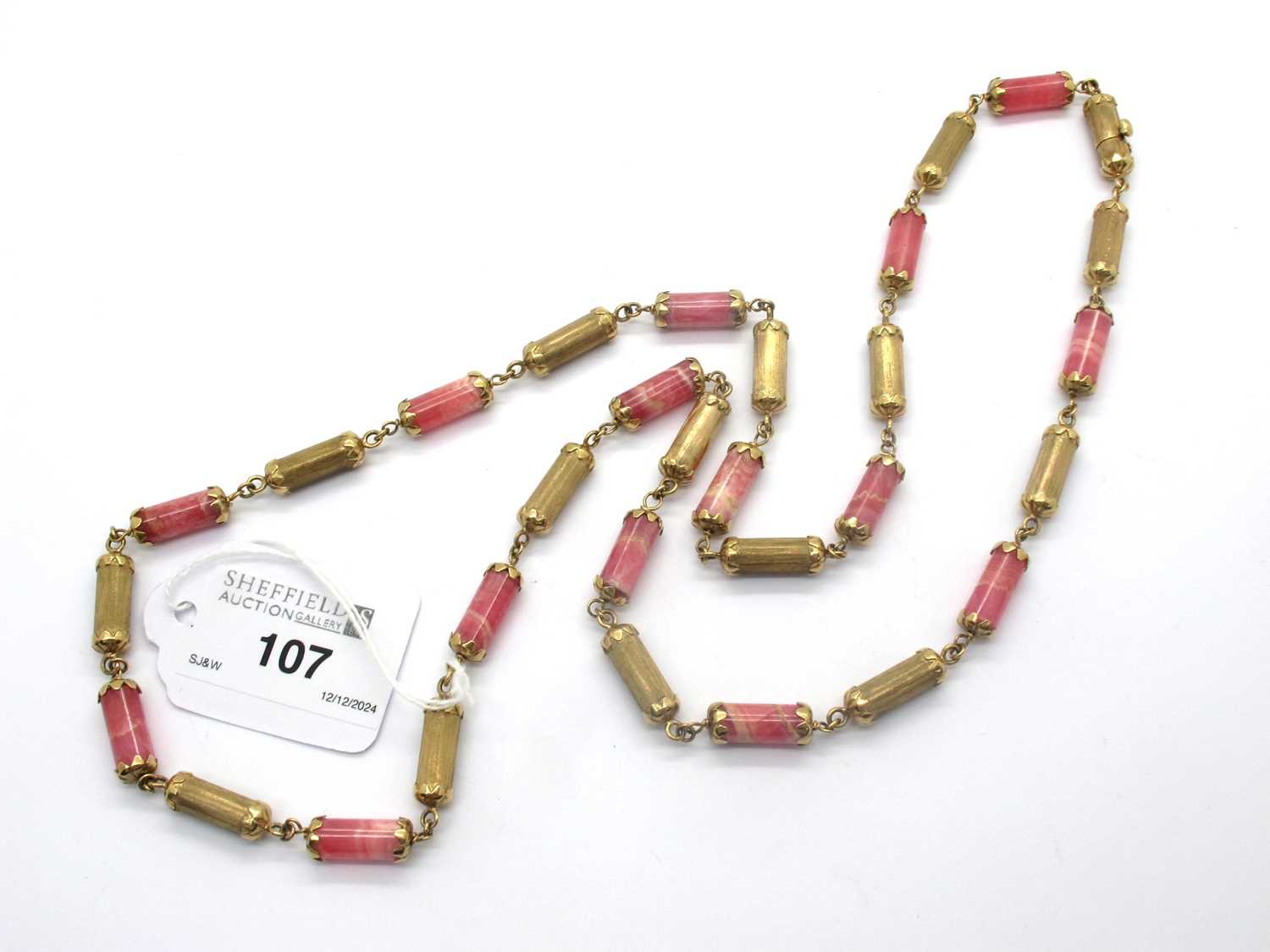 Lot 107 - Chiampesan; A 9ct Gold and Hardstone Panel...