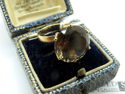 Lot 221 - A Vintage Smokey Quartz Single Stone Ring, the...