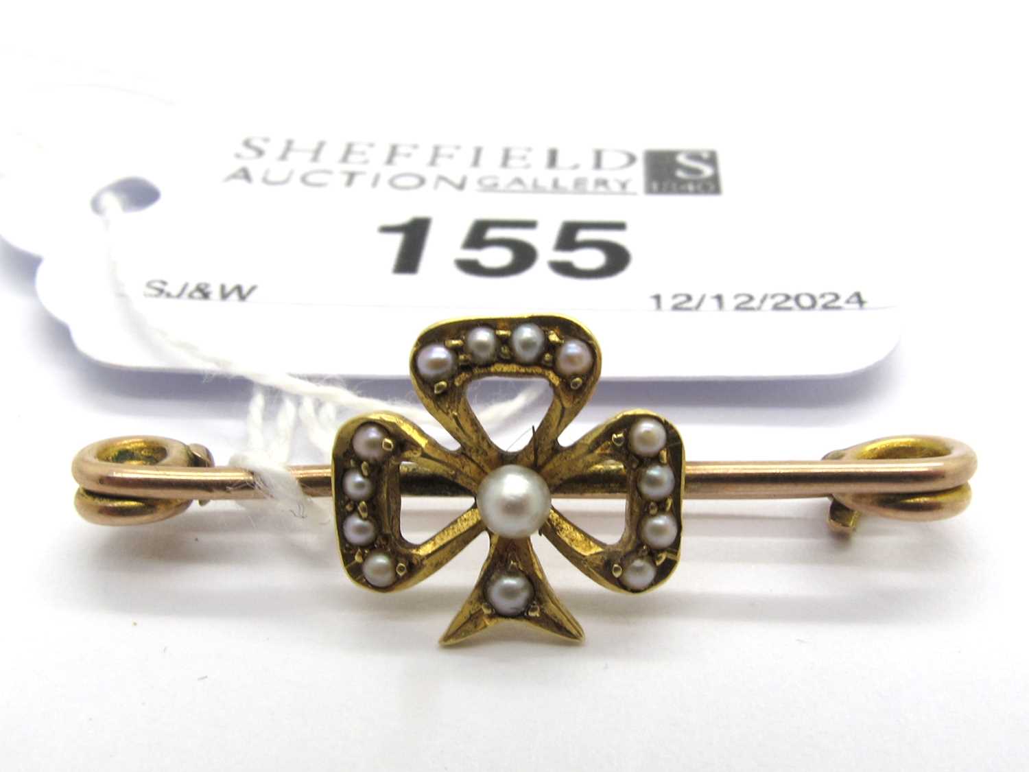 Lot 155 - An Edwardian Style Seed Pearl Clover Brooch,...
