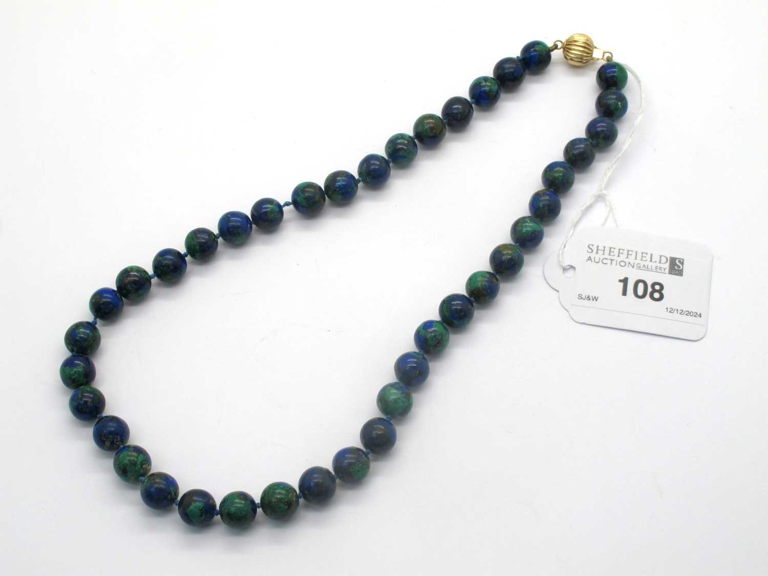 Lot 108 - A 14ct Gold Clasped Beaded Hardstone Necklace,...
