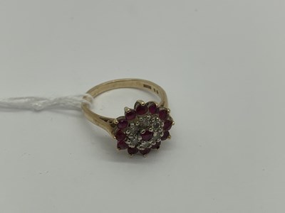 Lot 487 - A 9ct Gold Cluster Ring, of flowerhead design,...