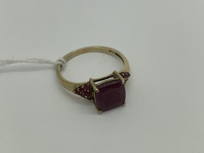 Lot 475 - A Modern Dress Ring, with a four claw...