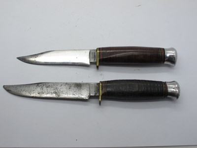 Lot 269 - William Rodgers Bowie Knives, leather handle...