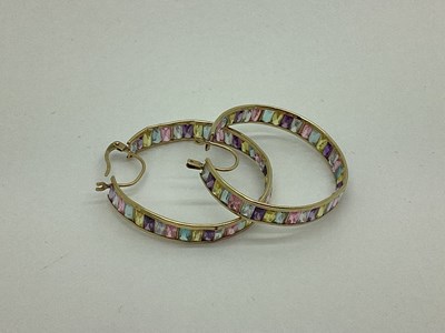 Lot 435 - A Pair Of Ornate Hoop Earrings, channel set...