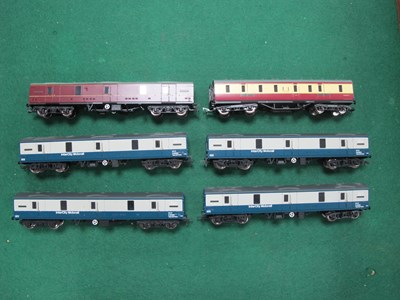 Lot 154 - Six OO Gauge Parcels Vans by Bachmann...