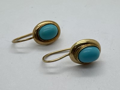 Lot 100 - A Pair of Stone Set Drop Earrings, the oval...