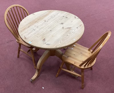 Lot 1544 - Pine Pedestal Table, with a circular top, on...