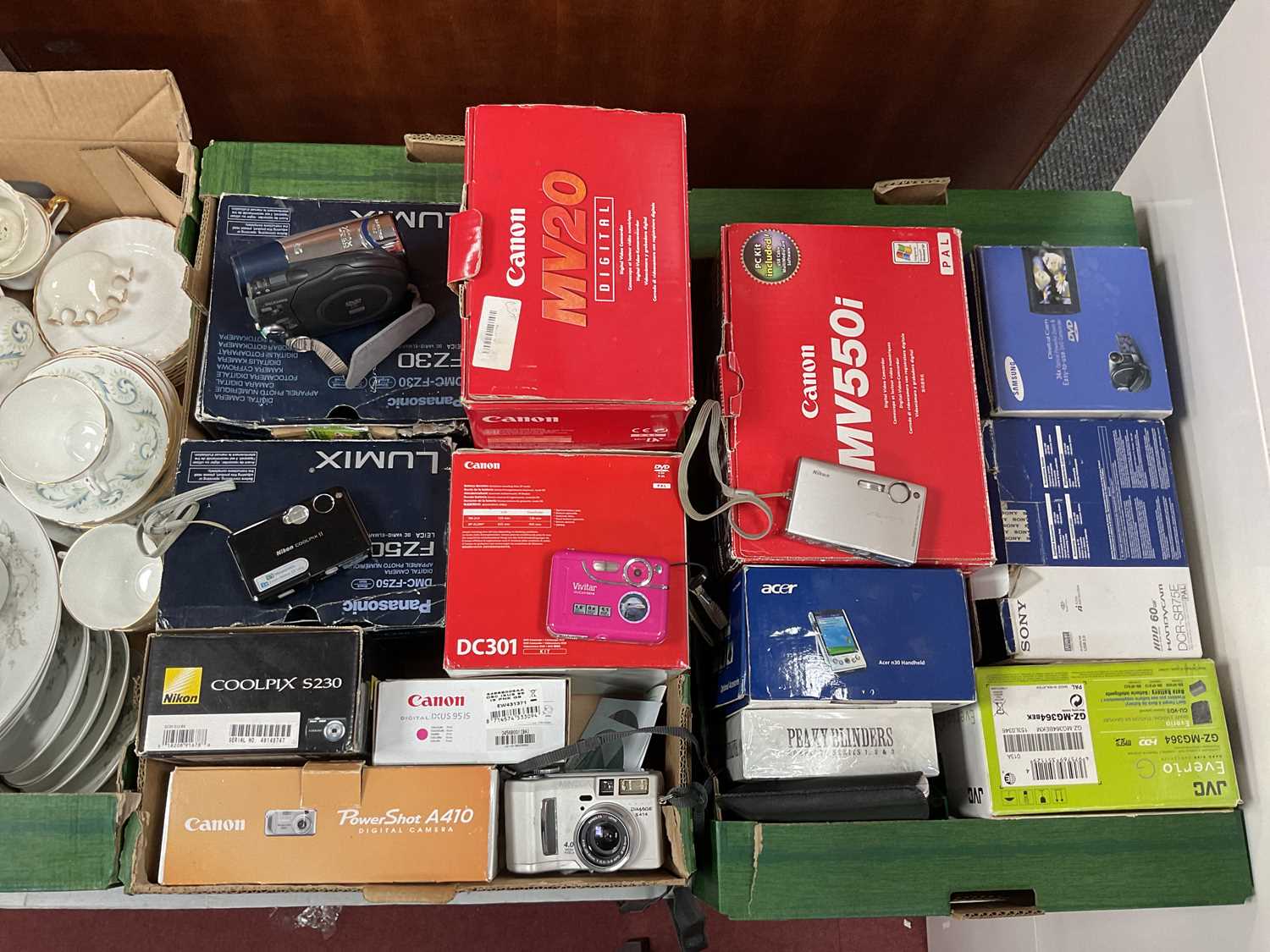 Lot 1073 - Cameras - Sony Handycam PCR-SR75E, Canon MV550,...