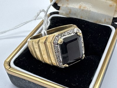 Lot 127 - A 9ct Gold Diamond and Stone Set Signet Style...