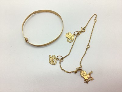 Lot 154 - A 9ct Gold Twisted Link Bracelet, suspending...