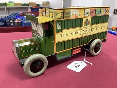 Lot 705 - A Post War Clockwork Tinplate 'Games Van' by...