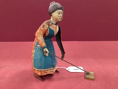 Lot 706 - A Pre War Tinplate Clockwork 'Busy Lizzie',...