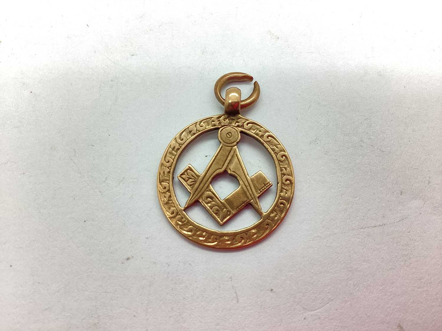 Lot 67 - A 9ct Gold Masonic Medallion Fob, square and...