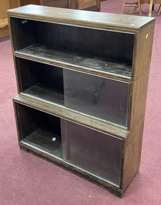 Lot 1534 - Minty Three Height Oak Bookcase, with glass...