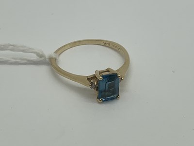 Lot 490 - A Modern Single Stone Dress Ring, rectangular...