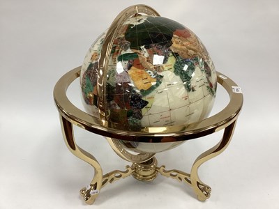 Lot 1574 - A Mineral Globe, in gilt metal stand with...