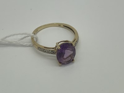 Lot 503 - An Amethyst Single Stone Ring, oval claw set,...