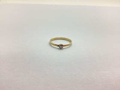 Lot 215 - A Dainty Single Stone Diamond Ring, the...