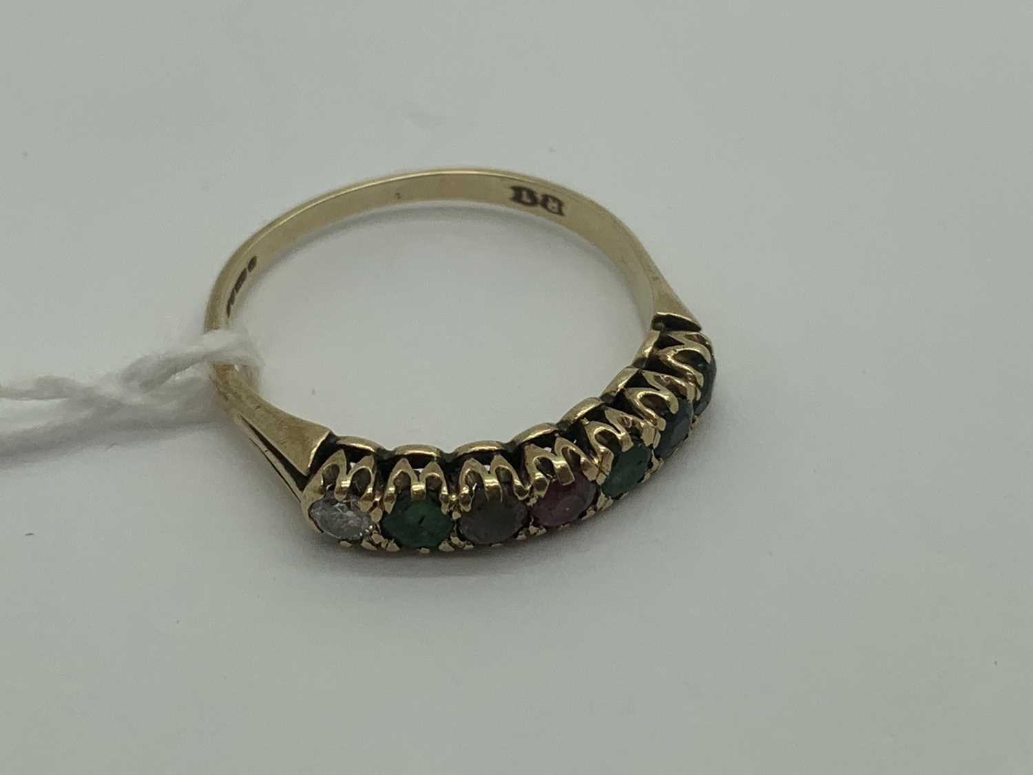 Lot 508 - A 9ct Gold 'Dearest' Ring, set with a diamond,...