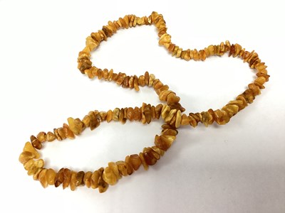 Lot 93A - An Amber Coloured Single Strand Beaded...