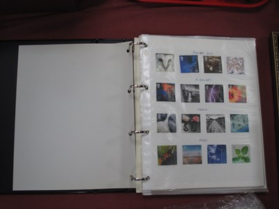 Lot 1373 - Stamps; A prestige album containing hinged...