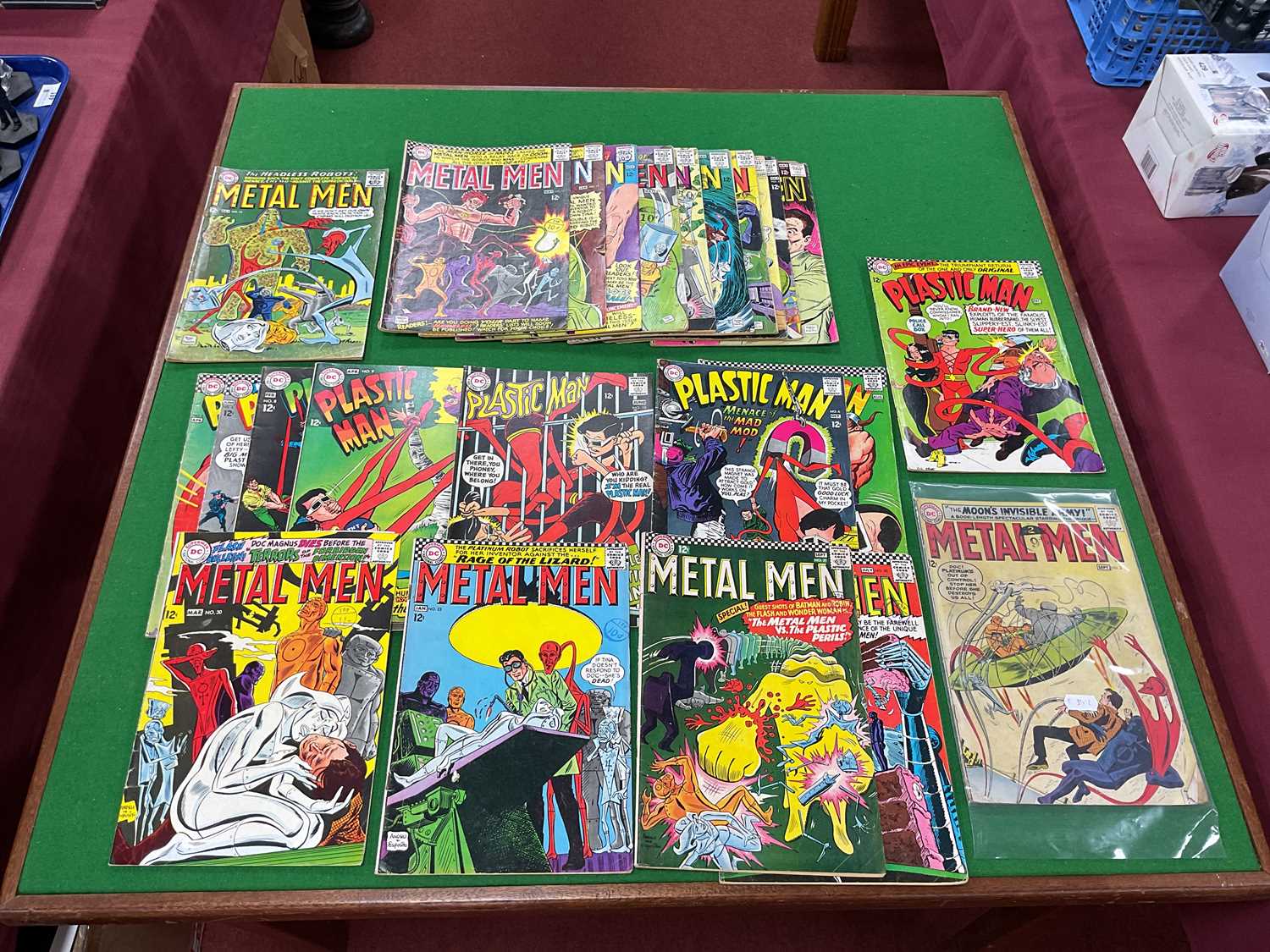 Lot 400 - Twenty Four DC Metal Men / Plastic Man Comics....