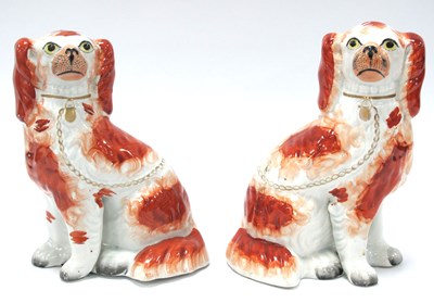 Lot 1255 - XIX Century Pair of Staffordshire Spaniels (2).