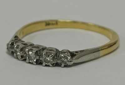 Lot 44 - A Five Stone Diamond Dress Ring, the brilliant...