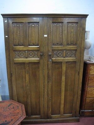 Lot 1577 - XX Century Oak Two Door Wardrobe with linen...